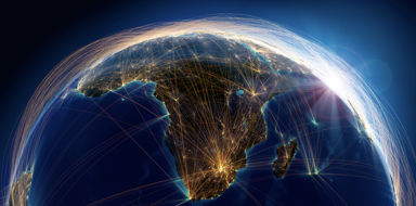 Picture of the earth with connectivity lines surrounding the earth.