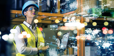Female manufacturer in factory looking at information on heads up display