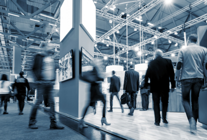 People moving around a manufacturing industry trade fair