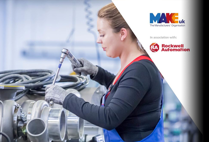 Female mechanic inspecting an engine