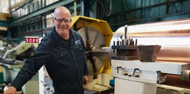 Engineer working on an industrial machine from BEP Surface Technologies