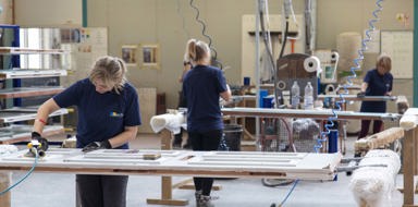 Engineers working in factory at Contactless Check Solutions