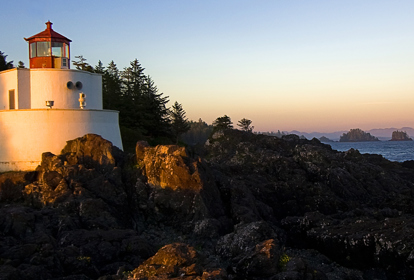 Lighthouse on a cliff overlooking the sea