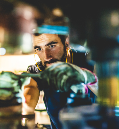 Worker Repairing Cold Forging Machine
