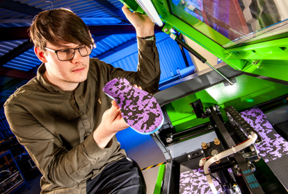 Engineer at Cadscan inspecting finished product