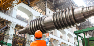 Manufacturing worker inspecting production line