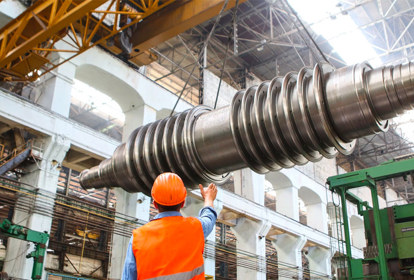 Manufacturing worker inspecting production line